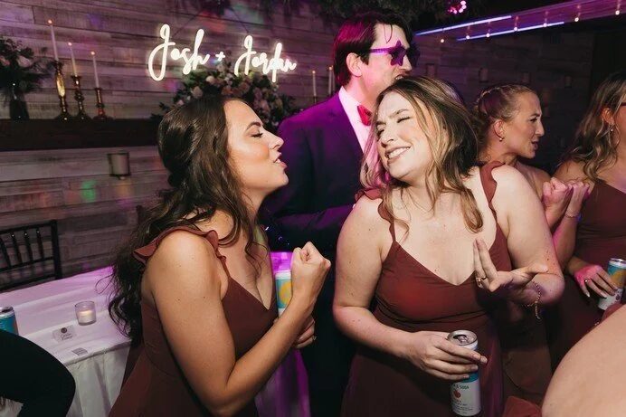 DJ Matt Iverson on the dance floor at a wedding