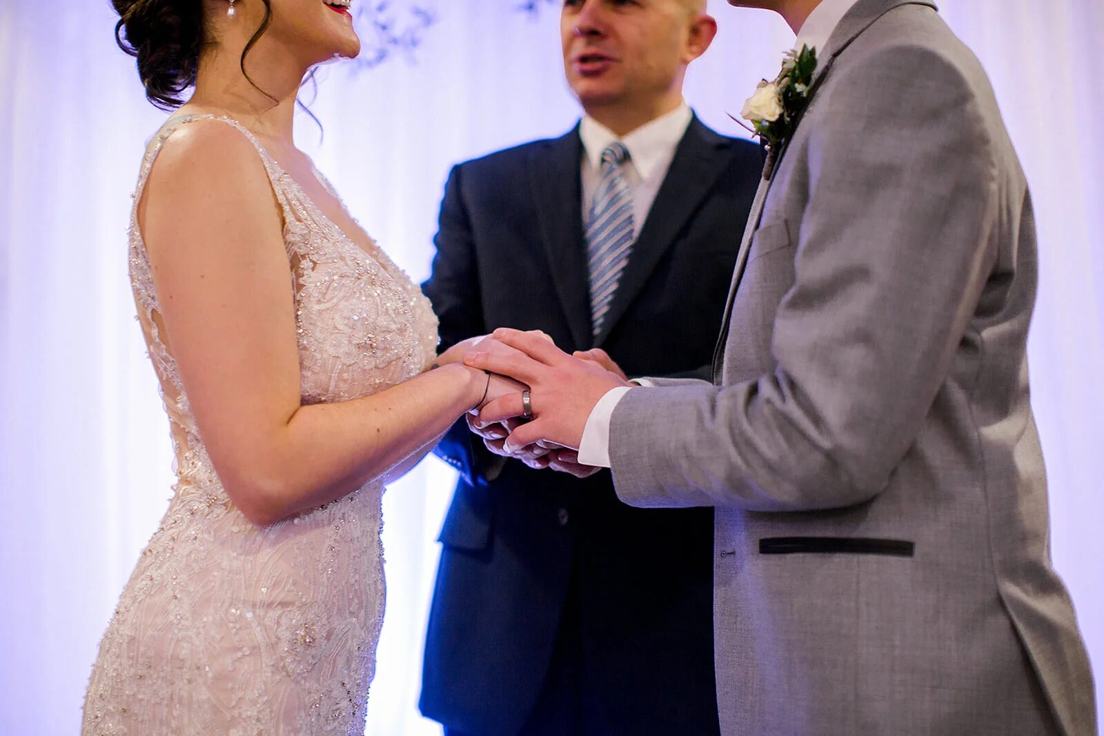 Rev. George Maverick helping a couple stay calm before the ceremony